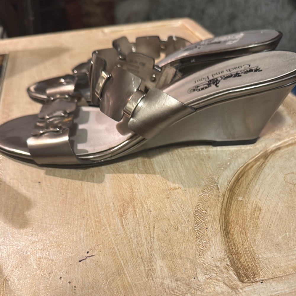 Coach and Four Tan Mules Sleek and Stylish
